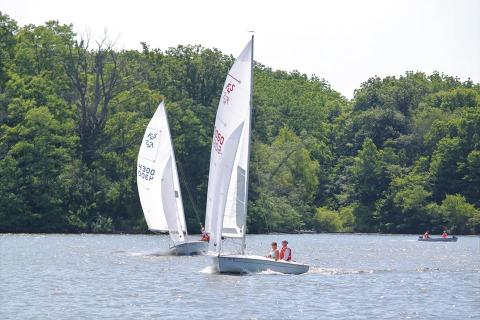 Frank and Marianne Gerry in a borrwoed boat since their was in a motor vehicle crash - gotta love this Flying Scot class!  - Picture by Sheila Krout